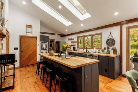 Custom Chefs kitchen tastefully restored with a mix of old and new.