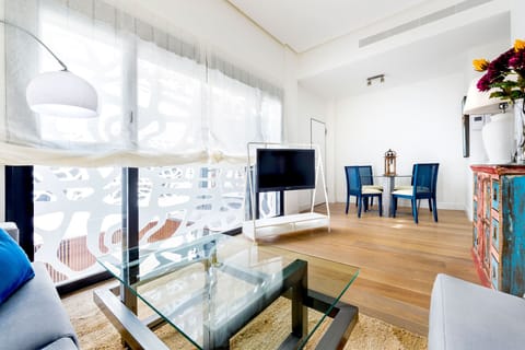 Apartment (2 Bedrooms) | Living area | 32-inch TV with cable channels