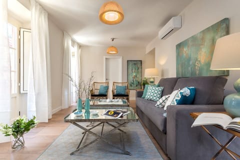 Apartment, 2 Bedrooms | Living room | 32-inch TV with cable channels