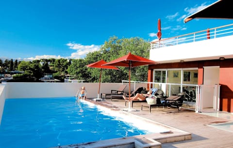 Take in gorgeous views while lounging around the on-site outdoor pool.