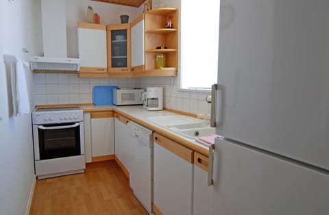 Standard Apartment, 3 Bedrooms | Private kitchen | Full-size fridge, microwave, stovetop, coffee/tea maker