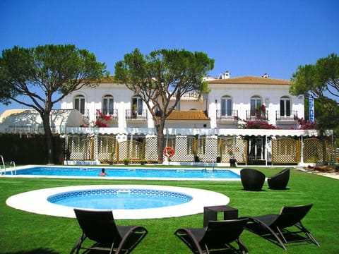 Seasonal outdoor pool, open 10:00 AM to 8:00 PM, sun loungers