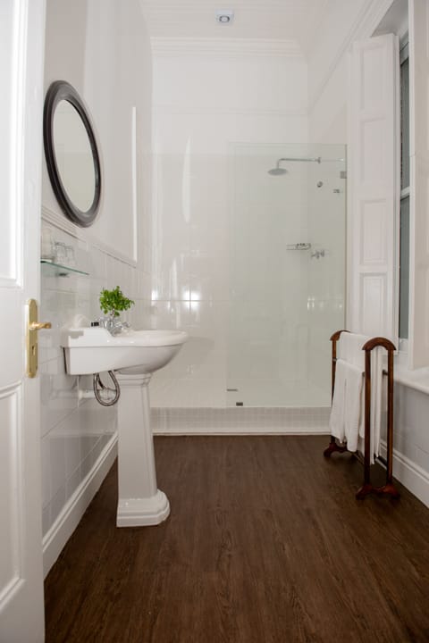 Shower, designer toiletries, hair dryer, bathrobes