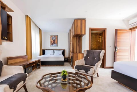 Deluxe Quadruple Room | Premium bedding, minibar, soundproofing, iron/ironing board