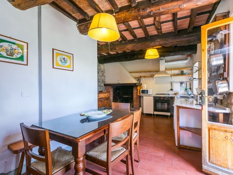 Furniture, Property, Table, Wood, Interior Design, Chair, Lighting, Yellow, Cabinetry, Floor