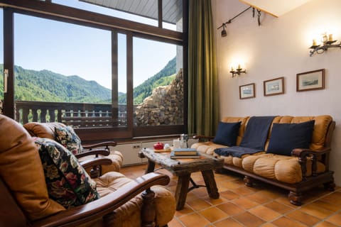 Living room with a private balcony & stunning Mont Blanc view