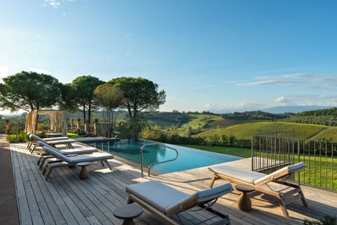 2 outdoor pools, open 9:00 AM to 7:00 PM, pool umbrellas, sun loungers