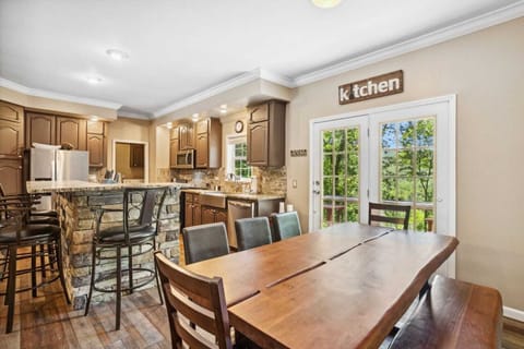 Dining Table Seats Eight with Additional Seating at the Kitchen Island