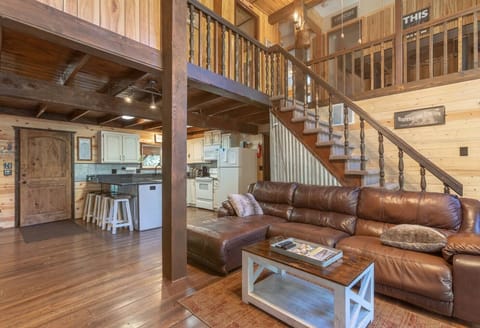 The open-concept living area feels cozy in this beautiful cabin.