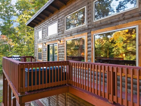Sunlit deck with forest views, perfect for morning coffee