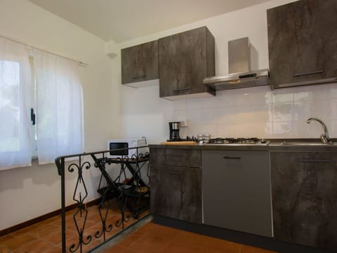 Kitchen, Countertop, Flooring, Furniture, Kitchen Appliance, Interior Design, Floor, Cabinetry, Major Appliance, Room