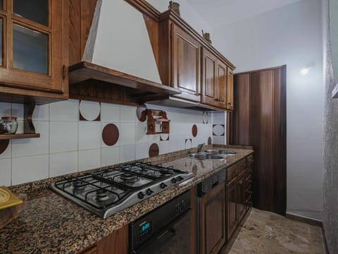 Cabinetry, Property, Countertop, Furniture, Kitchen Stove, Gas Stove, Cooktop, Building, Kitchen Appliance, Wood