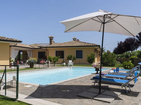 Water, Sky, Plant, Building, Shade, Swimming Pool, Outdoor Furniture, House, Arecales, Tree