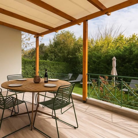 Shaded Outdoor Dining on the Terrace
A welcoming space for meals, drinks, and conversation.