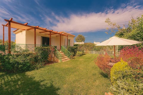 Tranquil Haven Tucked Among Greenery
Comfortable bungalows surrounded by lush landscaping.