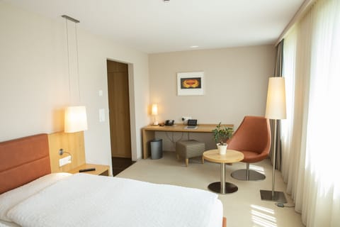 Premium bedding, down comforters, free minibar, individually decorated