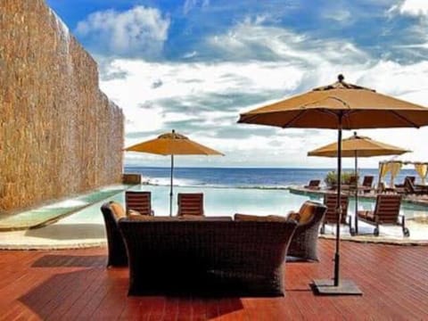 Steps away u have this beautiful pool overlooking the ocean