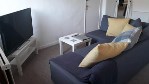 Comfort Apartment, 2 Bedrooms | Living room | 32-inch Smart TV with premium channels