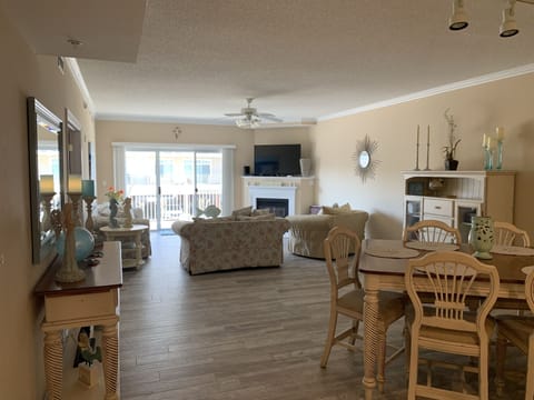 Spacious Living area with fireplace and balcony