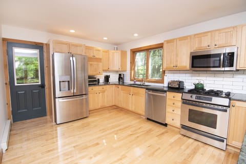 Updated Kitchen with Adirondack Green Granite counters.  Fully stocked!