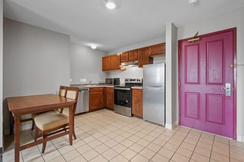 Standard Suite, Kitchen (1 Queen bed & 2 Double beds) | Private kitchen | Full-size fridge, microwave, stovetop, freezer