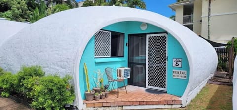 The iconic igloo-style exterior creates an unforgettable first impression, with curved architecture, tropical greenery, and a private entrance setting the tone for a playful beachfront escape.