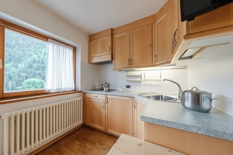 Family Apartment (Bilocale - House Lisetta) | Private kitchen | Shared fridge