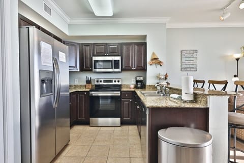 Upgraded High End Kitchen Cabinets Not Standard in Tidewater Condos All Stainless Appliances and Fully Stocked for Vacation Rental Cooking