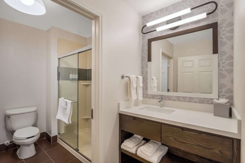 Suite, Multiple Beds (Two Bedroom Suite-King and 2 Queens) | Bathroom | Free toiletries, hair dryer, towels
