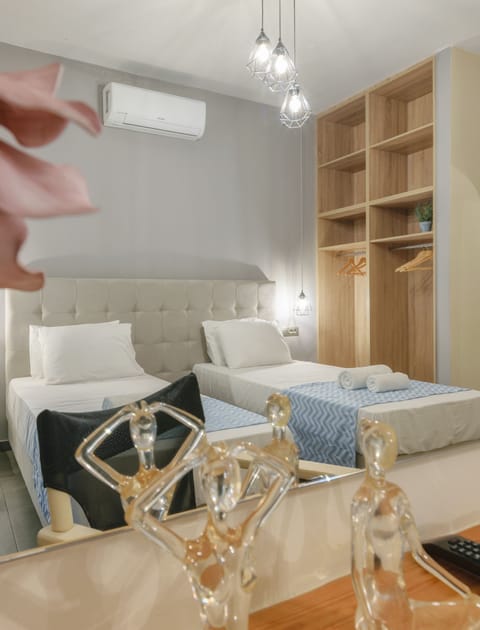 Triple Room, City View | Living area | 32-inch flat-screen TV with digital channels, TV, Netflix