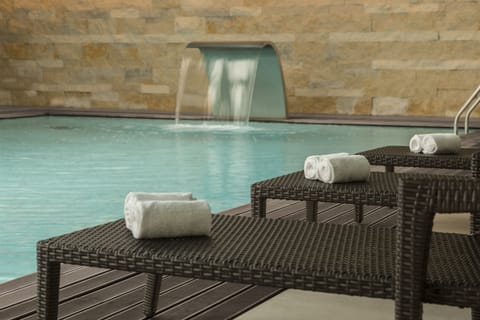 Indoor pool, open 9:00 AM to 9:00 PM, sun loungers