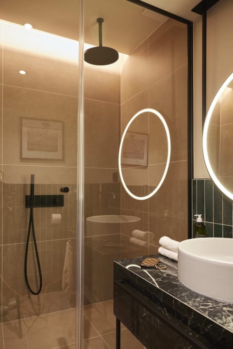 Hair dryer, bathrobes, slippers, towels