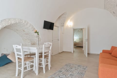 Apartment, 1 Bedroom | Living area | Flat-screen TV