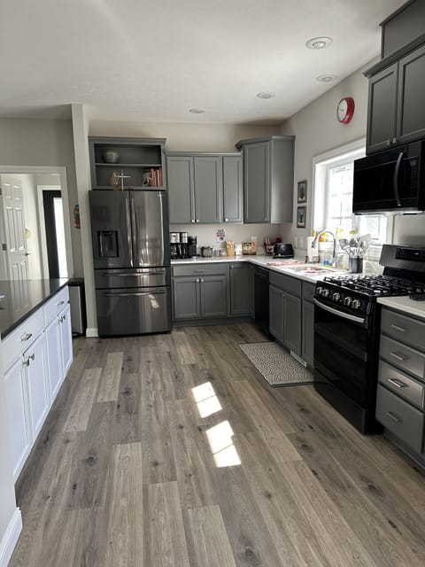 Large kitchen filled with all you need.