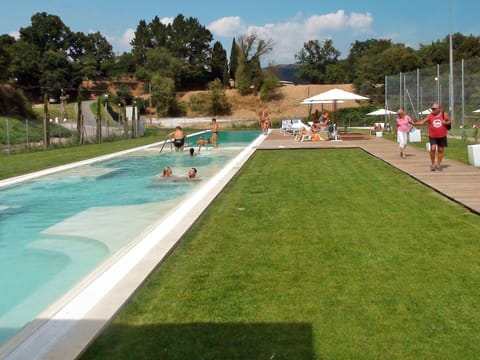 Blue, Swimming Pool, Outdoor Furniture, Shade, Eco Hotel, Leisure, Garden, Resort, Landscaping, Flowerpot