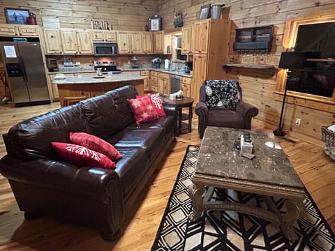 New Great room leather couch and coffee table.