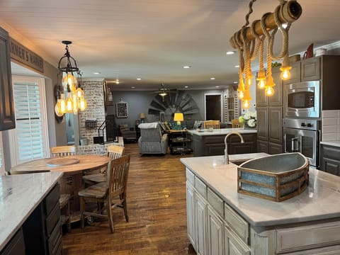 open concept kitchen and living with additional dining area