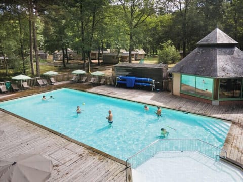 Seasonal outdoor pool, open 9:00 AM to 6:00 PM, pool umbrellas