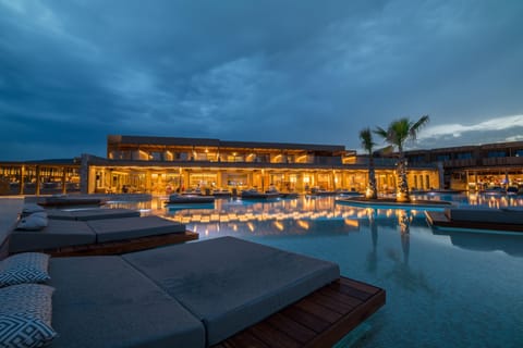 Outdoor pool, open 10:00 AM to 6:00 PM, pool umbrellas, sun loungers