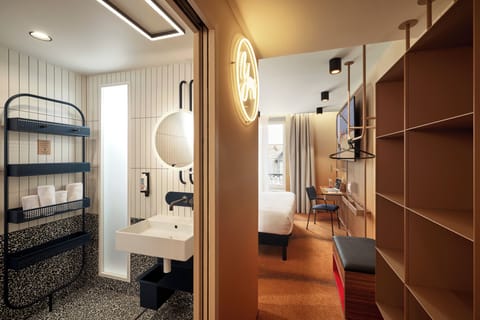 Premium bedding, laptop workspace, blackout drapes, soundproofing