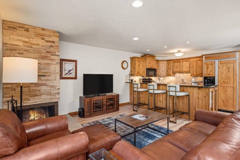 The living area is a perfect spot to relax in the evenings in front of the wood burning fireplace while sharing the days adventures.