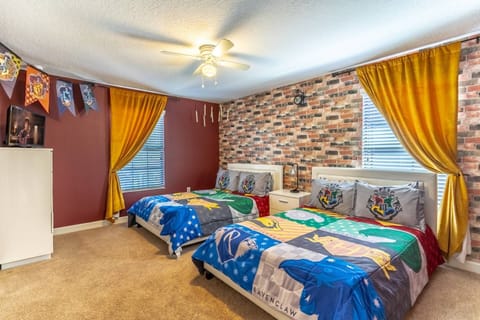 Second Floor Harry Potter Room! Double queen beds, TV and blackout curtains.