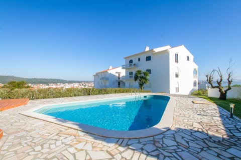 Pool area with views of the Lagoa (lagoon) and village