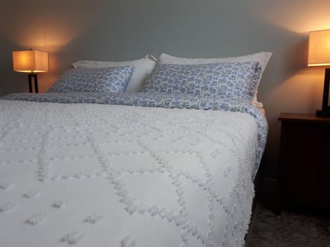 King size bed featuring a memory foam mattress for a superior sleep