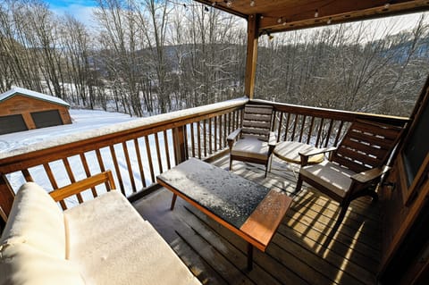 Enjoy a coffee on the private covered porch on the guest suite.