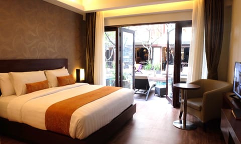 Deluxe Room, Pool Access | Memory foam beds, minibar, in-room safe, desk