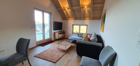 Family Apartment, Terrace | Living area | 55-inch Smart TV with satellite channels, TV