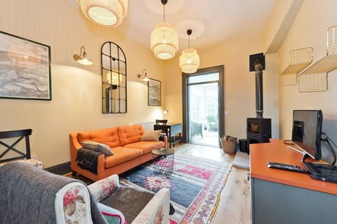 Luxury Apartment | Living room | 35-inch LED TV with digital channels, fireplace