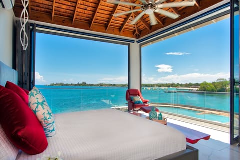 The upstairs master bedroom opens up to amazing views of Discovery Bay