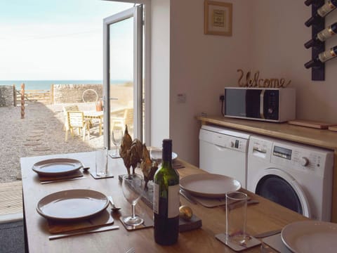 Beautiful kitchen opening onto the garden | Saltlife Cottage, Port William